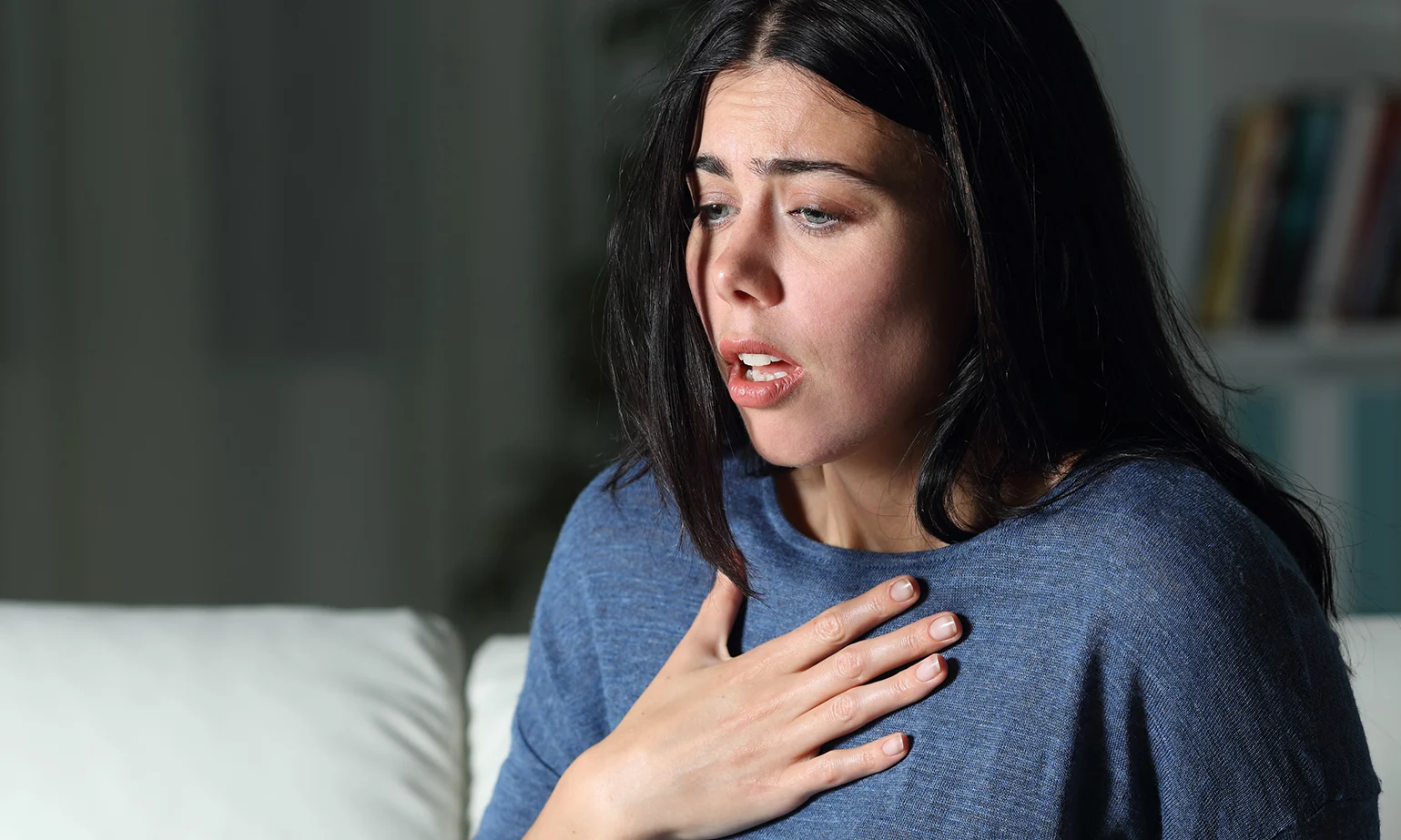 woman-suffering-an-anxiety-attack-alone-in-the-night-picture